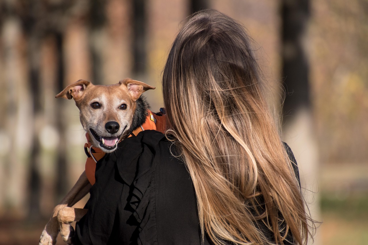 Happy pet parent with their beloved pet